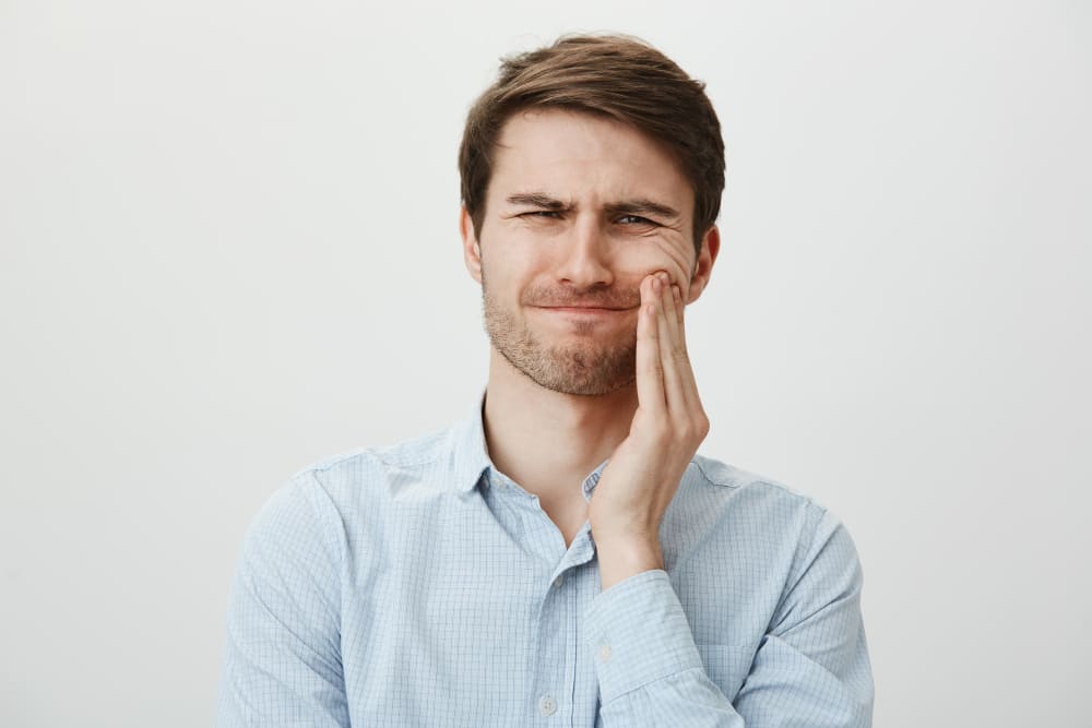 impianto dentale fallito sintomi